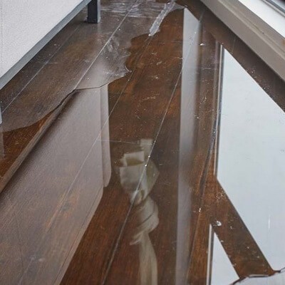 water standing on wood floor